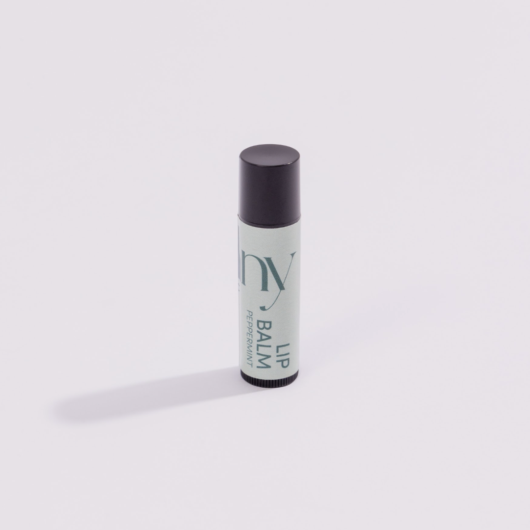 Lip balm with 'hunny' branding on a white background