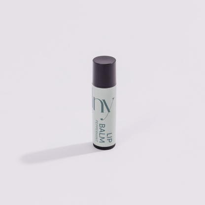 Lip balm with 'hunny' branding on a white background